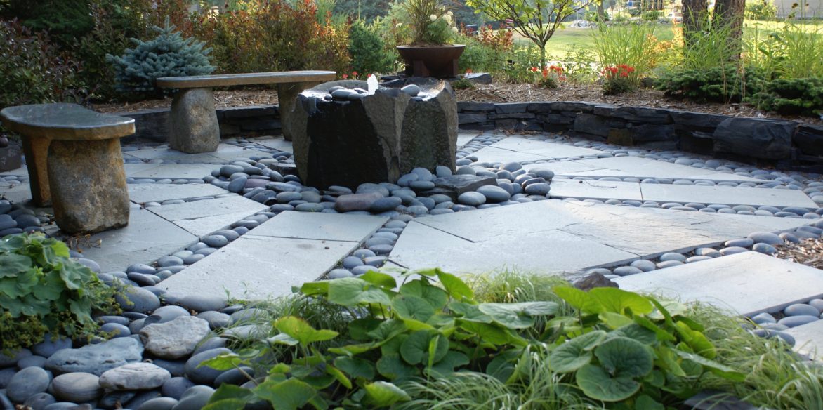 Stone patio with basalt fountain